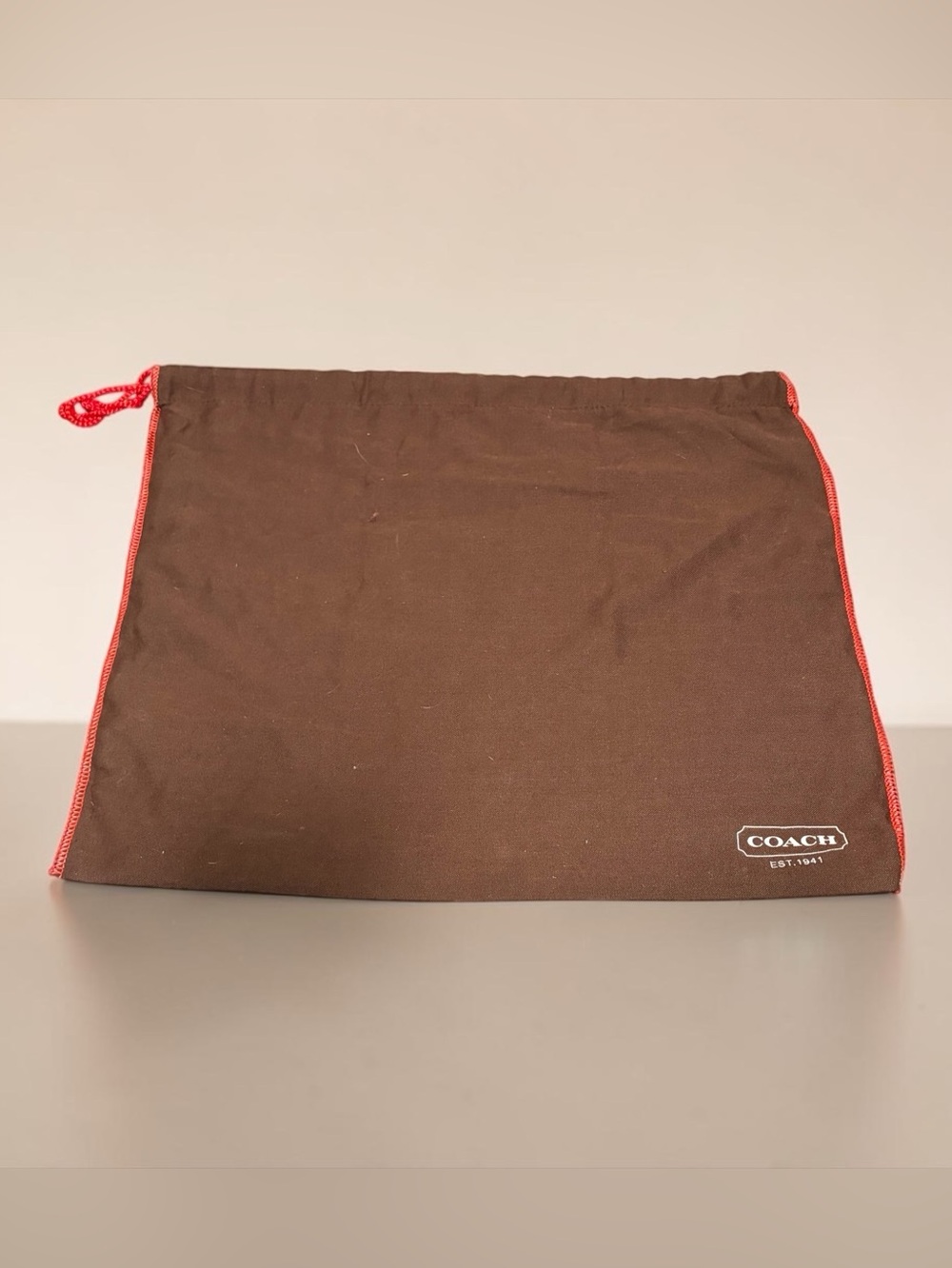 COACH Brown Dust Bag with Red Drawstring Trim
